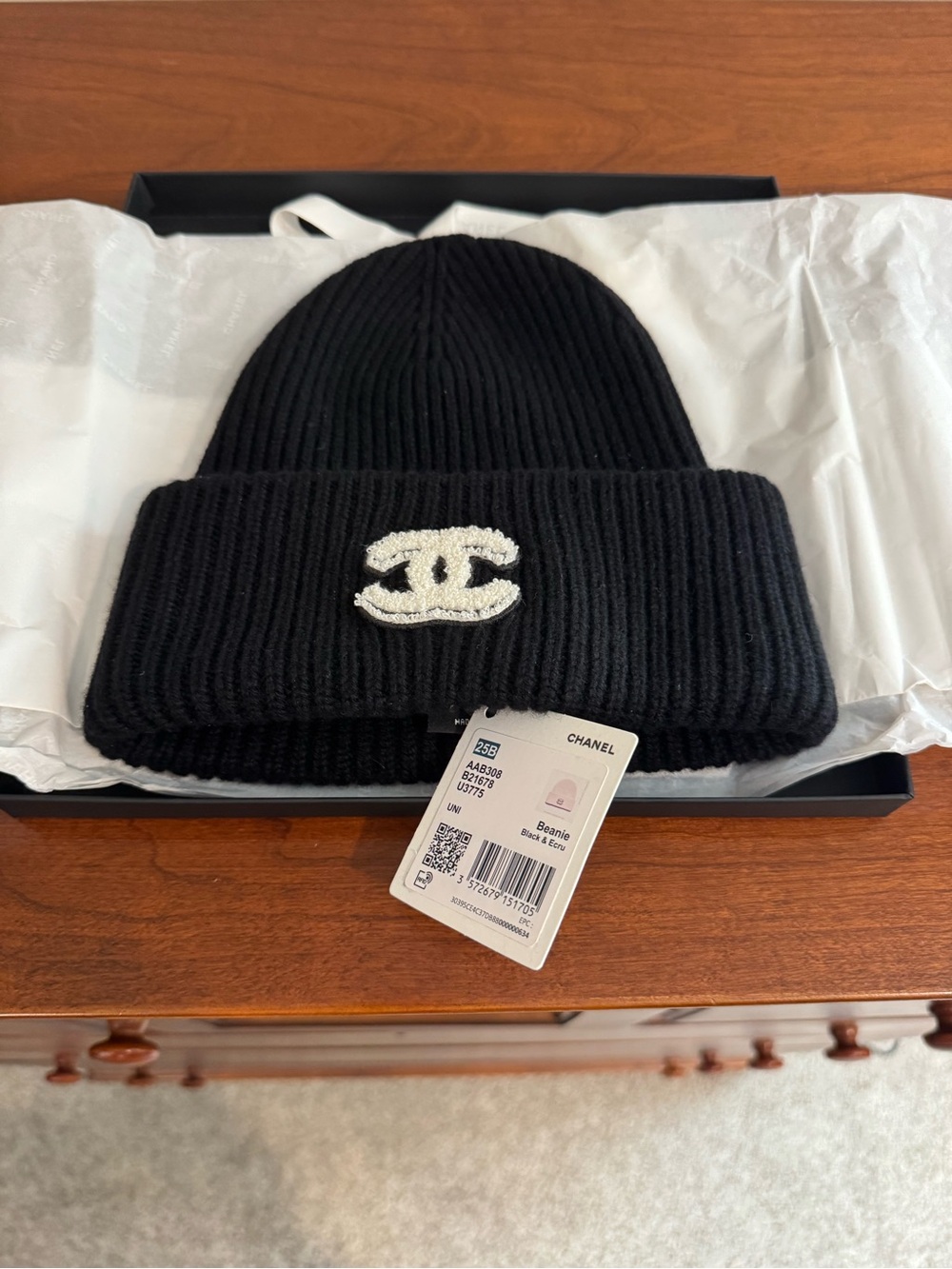 CHANEL Black Ribbed Knit Beanie with White CC Patch